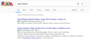 Google paid search results for yoga keyword