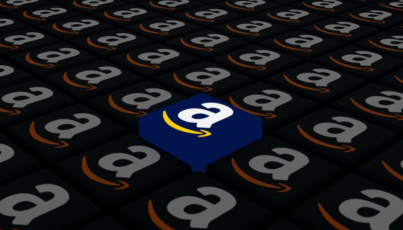 Melitopol, Ukraine - September 28, 2022: Amazon logo icon isolated on shape of cubes. Amazon is an American international electronic commerce company. Internet shopping service.